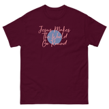 JESUS MAKES THE WORLD GO ROUND MAROON T SHIRT WITH PINK LETTERS AND BLUE CIRCLE IN MIDDLE