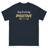 STAY POSITIVELY POSITIVE NAVY BLUE T SHIRT WITH WHITE AND GOLD LETTERS AND GOLD ARROW AT BOTTOM