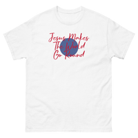 JESUS MAKES THE WORLD GO ROUND WHITE T SHIRT RED LETTERS AND BLUE ROUND CIRCLE IN MIDDLE  